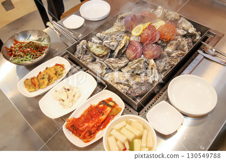 Korean Seafood Food. Steamed oysters and scallops Korean Seafood Food. Steamed oysters and scallops 130549788