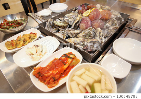 Korean Seafood Food. Steamed oysters and scallops Korean Seafood Food. Steamed oysters and scallops 130549795