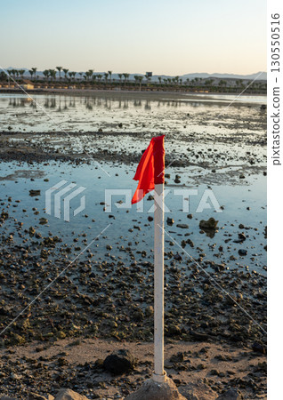 Shallow Bay at Marsa Alam Resort with Mountains 130550516