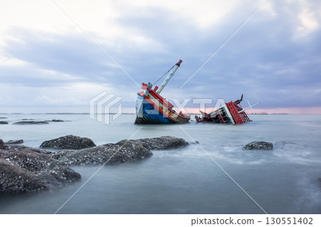 Old wrecked fishing boat on coast of Ang Sila Village, Chonburi Province of thailand. 130551402