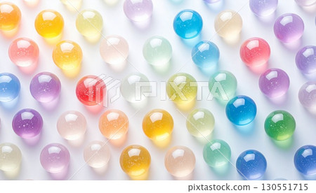 Colorful candy with jewel-like transparency and reflective properties 130551715