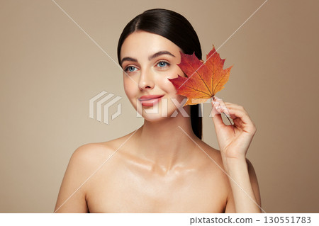 Autumn portrait of beautiful woman with clean fresh skin 130551783