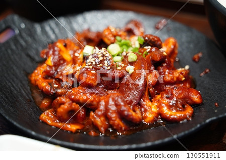 Spicy Stir-Fried Korean Baby Octopus with Sesame Seeds and Scallions 130551911