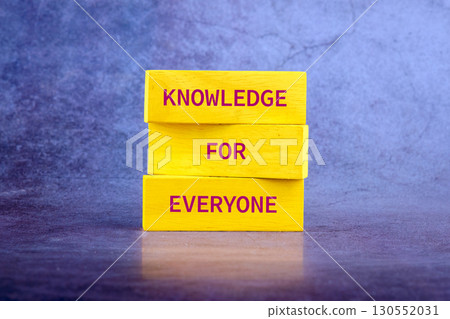 Education Concept text KNOWLEDGE FOR EVERYONE on wooden blocks on a bright background 130552031