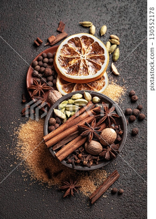 Christmas spices close up. Seasonal winter spices for mulled wine. Christmas spices close up. Seasonal winter spices for mulled wine. 130552178