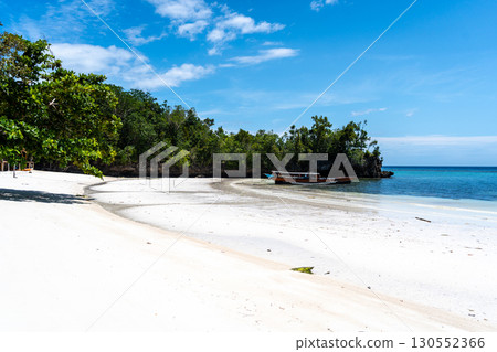 Traditional boat on Lia beach, Waleakodi Island, Togian archipelago, Sulawesi, Indonesia 130552366