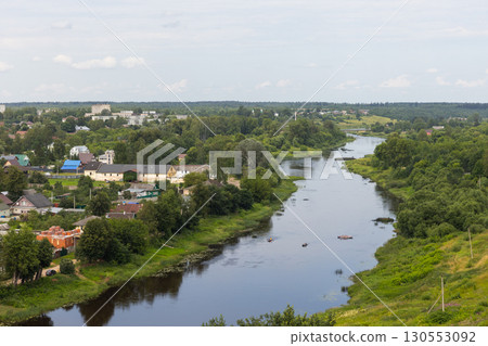 Landscape of Torzhok, Russia. Peaceful riverside view featuring a tranquil villages 130553092