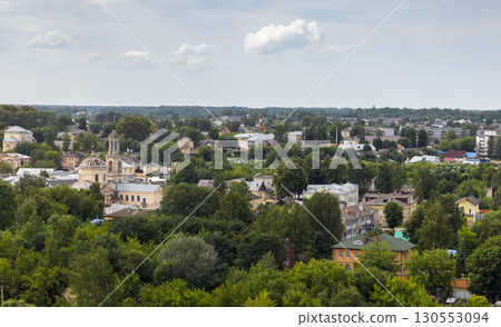 Scenic old town view highlighting lush greenery and historical architecture Scenic old town view highlighting lush greenery and historical architecture 130553094