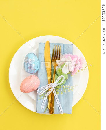 Easter celebration concept. Top view Napkin white plate eggs, isolated background, banner Easter celebration concept. Top view Napkin white plate eggs, isolated background, banner 130553266