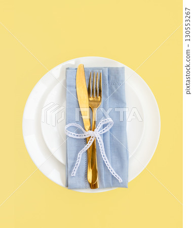 Easter celebration concept. Top view Napkin white plate eggs, isolated background, banner Easter celebration concept. Top view Napkin white plate eggs, isolated background, banner 130553267
