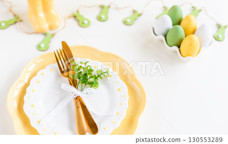 Easter celebration concept. Top view vertical empty dishes Easter eggs, isolated background, banner Easter celebration concept. Top view vertical empty dishes Easter eggs, isolated background, banner 130553289