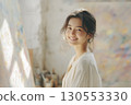 Portrait of a female painter in her 20s 130553330