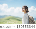Woman in her 20s hiking portrait 130553344
