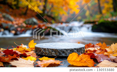 Stone Podium by the Stream with Autumn Leaves 130553880