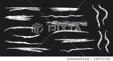 Chalk strokes grunge textured charcoal underlines doodle lines hand drawn chalk brush strokes in white on black background. 130555350