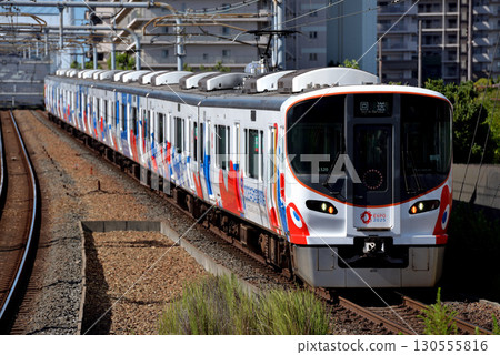 Eight 323 series out-of-service trains running on the JR Yumesaki Line Eight 323 series out-of-service trains running on the JR Yumesaki Line 130555816
