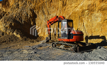 Red bulldozer at quarry site Red bulldozer at quarry site 130555840