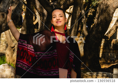 Woman posing near Herodes Atticus Odeon in Acropolis, Athens, Greece. Woman posing near Herodes Atticus Odeon in Acropolis, Athens, Greece. 130556518