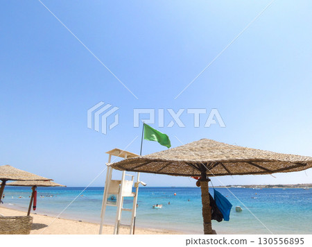 A picture of the beach in a luxury resort in Hurghada, by the the Red Sea, Egypt 130556895