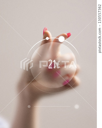 Bold artwork. Hand with pink nails adjusting futuristic digital thermostat showing 21 degrees Celsius Bold artwork. Hand with pink nails adjusting futuristic digital thermostat showing 21 degrees Celsius 130557362