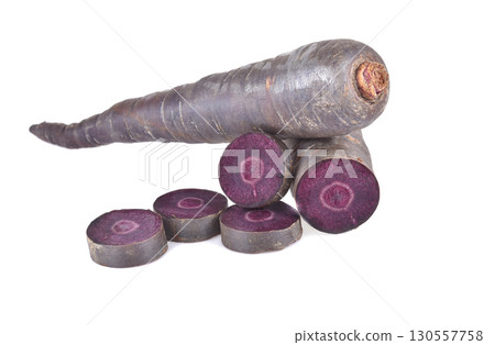purple carrot isolated on white background. purple carrot isolated on white background. 130557758
