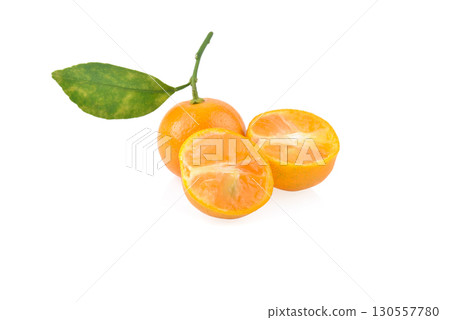 kumquat orange that placed on white background. 130557780