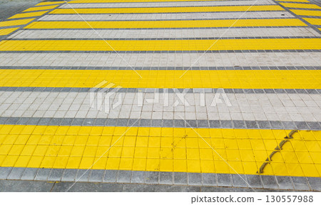 Vibrant yellow pedestrian crosswalk Vibrant yellow pedestrian crosswalk 130557988