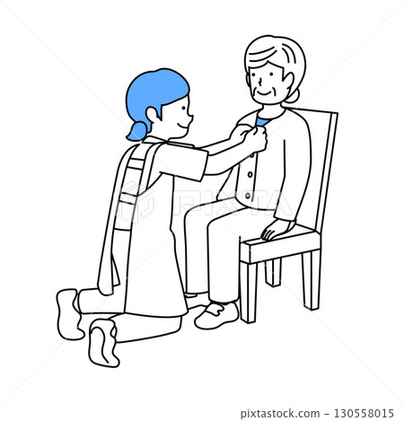 A caregiver assisting an elderly person with changing clothes 130558015