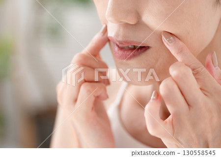 Woman, nasolabial folds, mouth area, worries 130558545