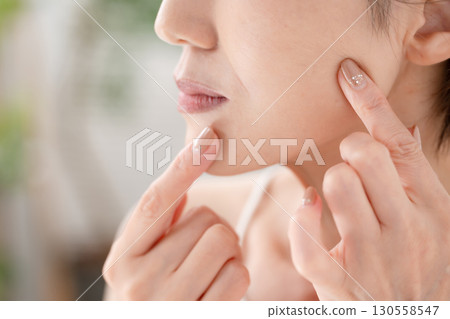 Woman, nasolabial folds, mouth area, worries 130558547