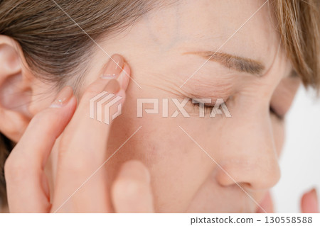Woman eye worries Woman eye worries 130558588