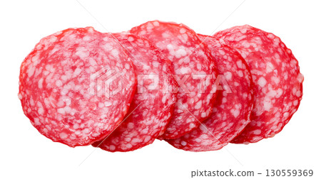 Sausage slices cut on a white background. Top view Sausage slices cut on a white background. Top view 130559369