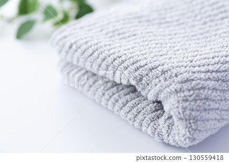 New grey face towel New grey face towel 130559418