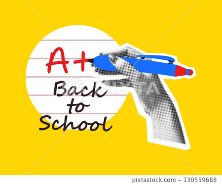 Hand with pen writing A plus back to school concept 130559688