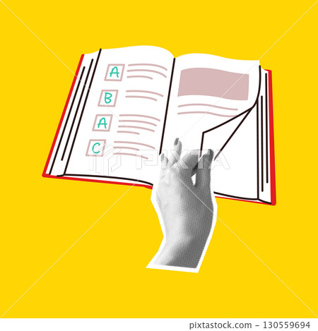 Hand turning page of book with ABC format 130559694
