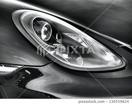 Black sports car headlights 130559824