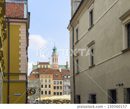 Warsaw Poland May 20 2025 Narrow street view leading to Old Town square, with colorful historic 130560157