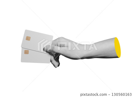 A hand presents a bank card with visible chip isolated.. 130560163