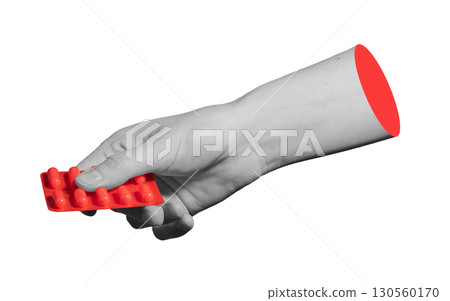 Blister pack of red tablets in hand. Symbol of drug prescription, medication, and pharmaceutical Blister pack of red tablets in hand. Symbol of drug prescription, medication, and pharmaceutical 130560170