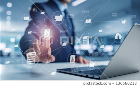 Businessman touching a touch panel with his finger, business scene in the office, office work, digital network 130560218