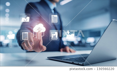 Businessman touching a touch panel with his finger, business scene in the office, office work, digital network Businessman touching a touch panel with his finger, business scene in the office, office work, digital network 130560220