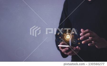 Young man with smartphone mobile hand touching to visualize money growth Young man with smartphone mobile hand touching to visualize money growth 130560277