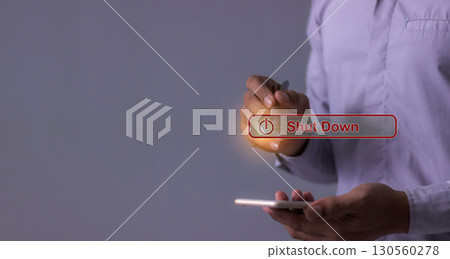 Young man with smartphone hand using a pen touching Shut Down button press power OFF Young man with smartphone hand using a pen touching Shut Down button press power OFF 130560278