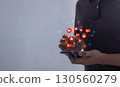 Young man hand Holding, Using smart phone mobile with Love, Follow and Comment Icon to Social Media 130560279