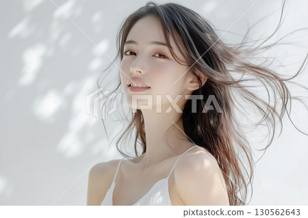 Natural portrait of a young woman with long hair. Beauty material 130562643