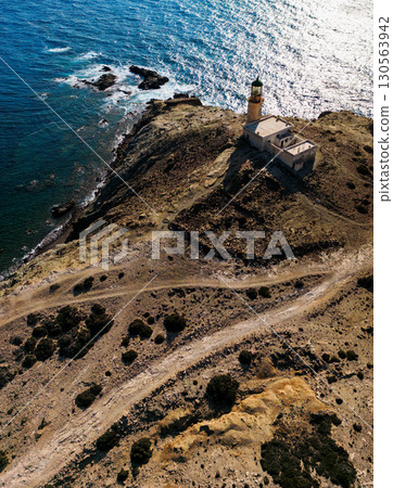 Lighthouse standing on rocky Lighthouse standing on rocky 130563942