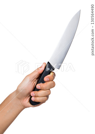 Hand holding sharp stainless steel chef's knife, professional kitchen tool isolated on transparent background 130564490