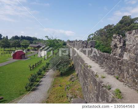 Ancient Roman Fortress, old stone wall. Antique archaeology fortification Ancient Roman Fortress, old stone wall. Antique archaeology fortification 130564563