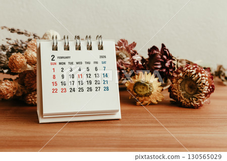 February 2026 calendar and dried flowers February 2026 calendar and dried flowers 130565029