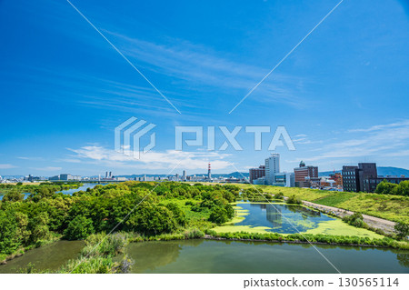 View of the left bank of the Yodo River upstream from Sugawara Johoku Bridge, Osaka City View of the left bank of the Yodo River upstream from Sugawara Johoku Bridge, Osaka City 130565114